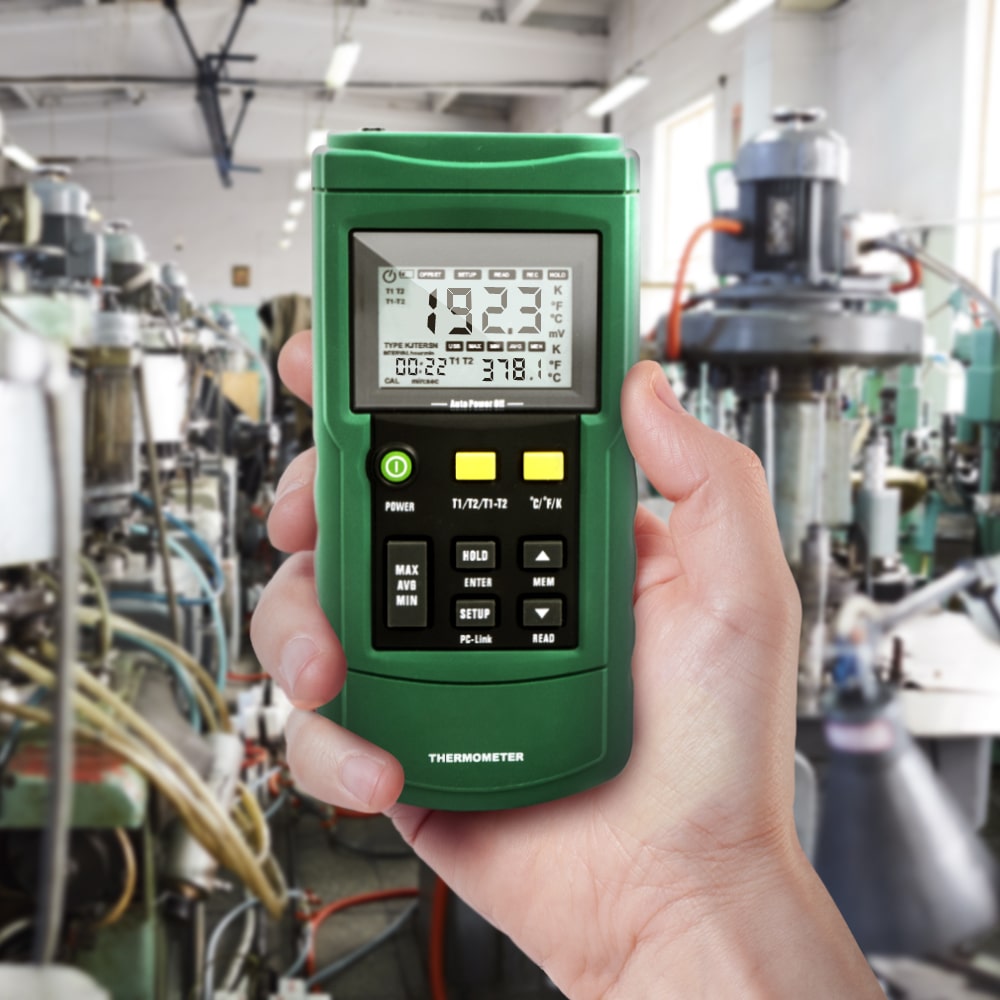 hand holding PerfectPrime TC2100 thermocouple thermometer