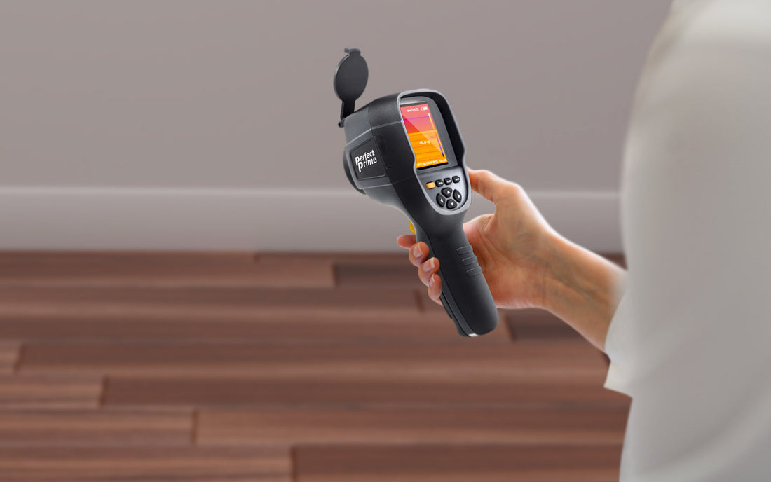 man holding perfectprime thermal camera IR0018