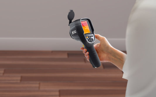 man holding perfectprime thermal camera IR0018