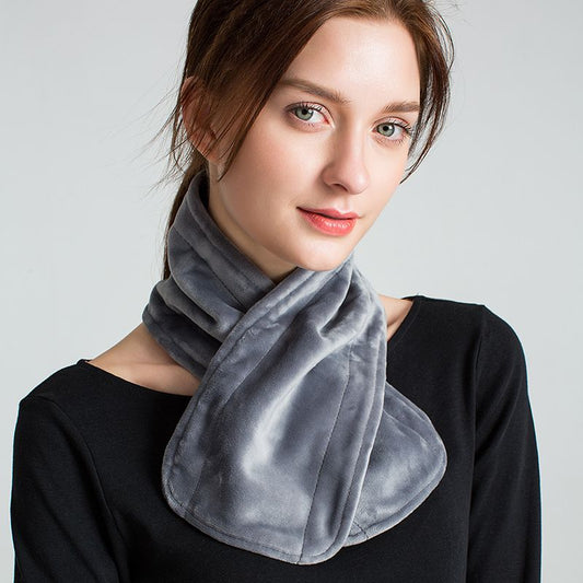 Model with grey scarf around neck